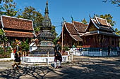 Wat Xieng Thong temple in Luang Prabang, Laos. Small 'that' (stupa) inside the temple precinct. 